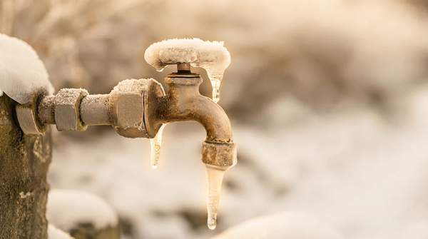 Editorial illustration for How to Winterize Outdoor Faucets: The Right Steps for Homes With and Without a Shutoff Valve